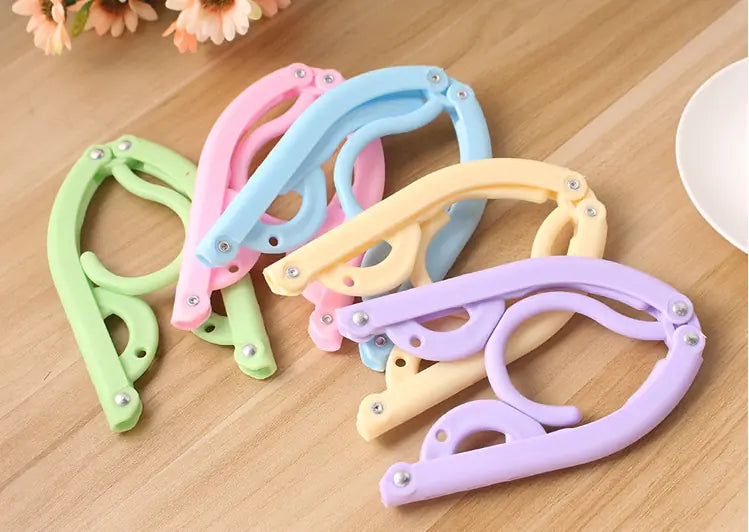 Portable Magic Plastic Travel Folding Clothes Hanger